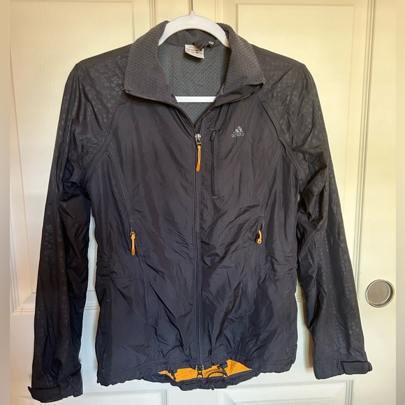 Adidas small grey patterned rain jacket with orange accents - Picture 1 of 4